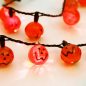 Preview: Leuchtende Halloween LED-Halskette Kürbiss