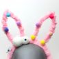 Preview: LED Plüsch-Hasenohren mit kleinem Häschen