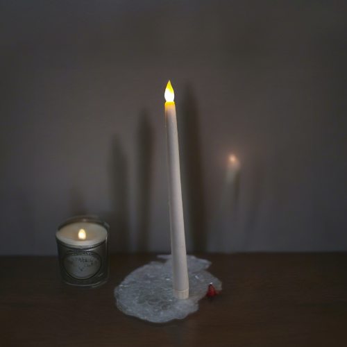 led candle in glass