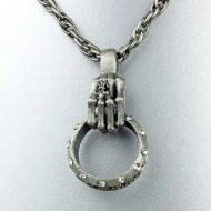 Bone hand with ring chain made of tin